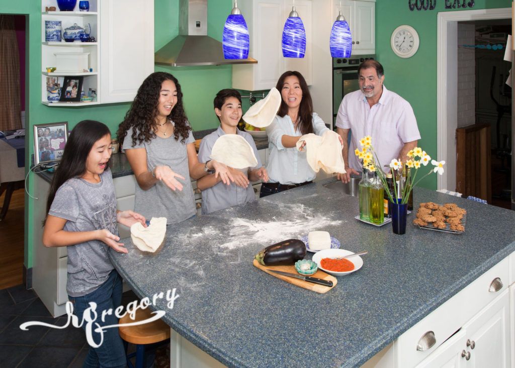 Volpe family candid portrait cooking together