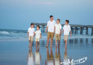 Replogle family children photo reflection on wet beach